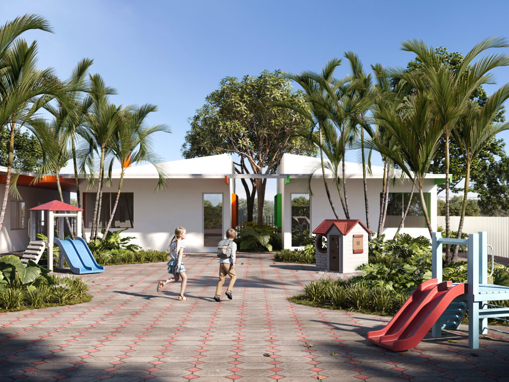 Playground with two children running, slides, a playhouse, and tropical landscaping with palm trees, Guayaquil, Ecuador