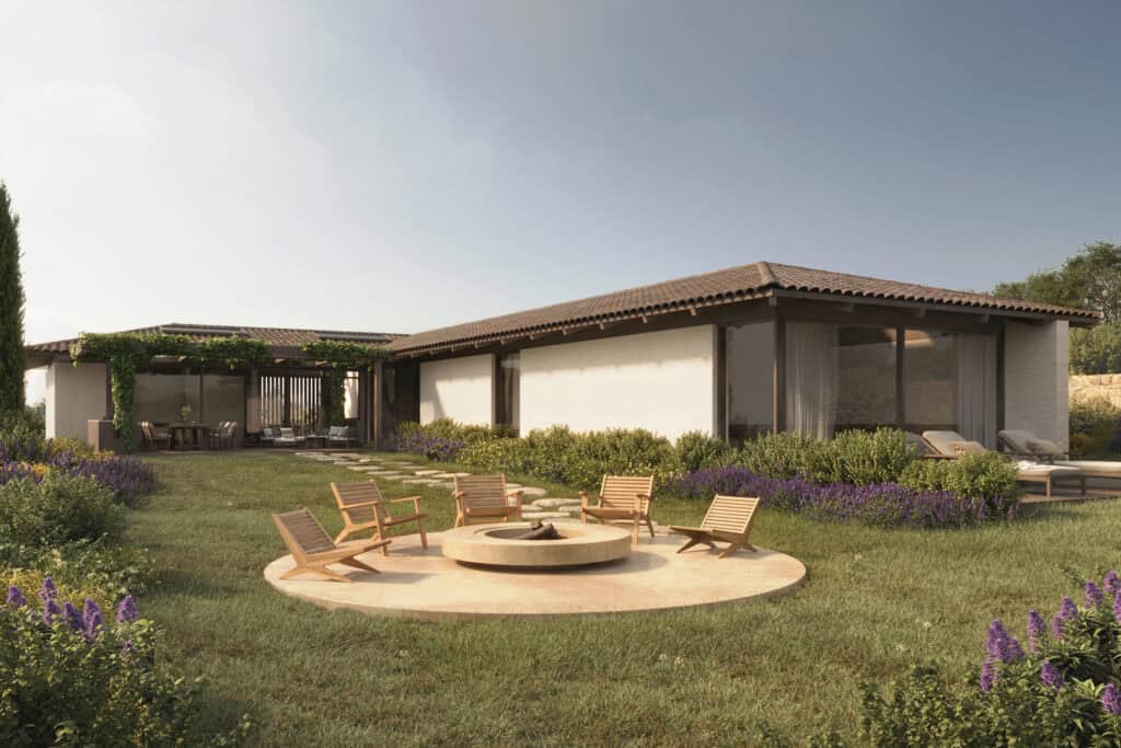 House design featuring a circular fire pit, wooden patio furniture, and a landscaped garden, Portugal
